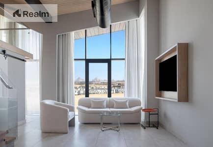 A Hyatt Centric hotel apartment with a view of the Pyramids, situated in a prime location atop the plateau.