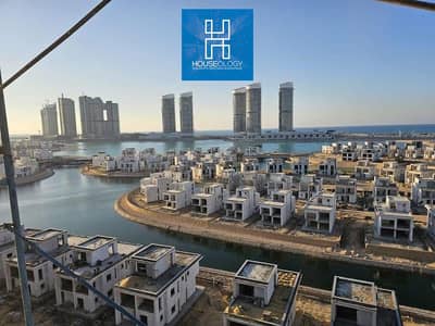 Installments over 7 years, immediate occupancy in New Alamein, 3-bedroom apartment, sea view, 230 sq m, prime location, fully finished