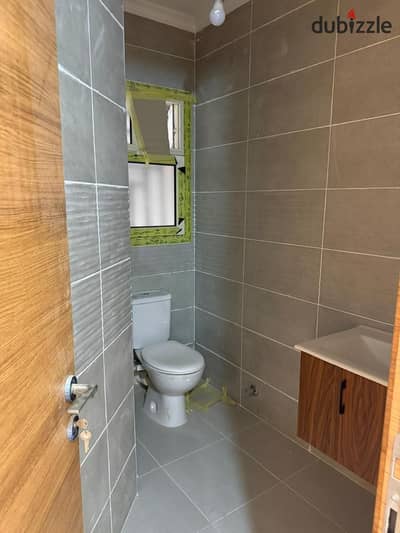 Distinctive apartment for rent in the compound of Cairo University - Dahshur Road with an area of 191 square meters - Ground floor - Elegant finishing