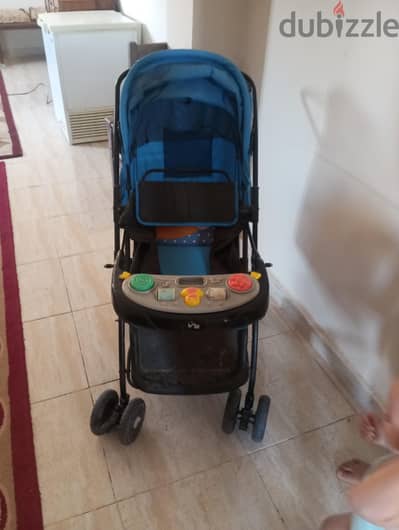 عربة أطفال Ocie بحالة ممتازة ومميزات رائعة للراحة واللعب