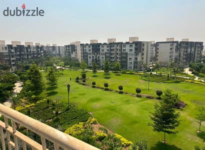 A hotel-style apartment with a stunning view of Wide Garden, fully furnished and available for rent in the newest phase of Madinaty.