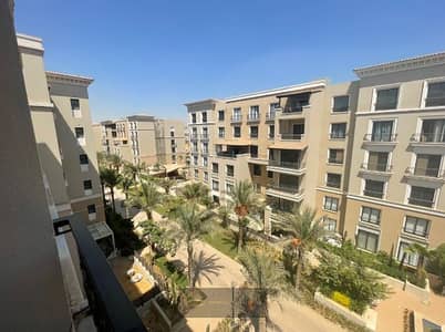 Opportunity for rent in the kitchen and air conditioning, a very special apartment, repeated floor with an open view of the landscape inside | Compound Village West - Sheikh Zayed