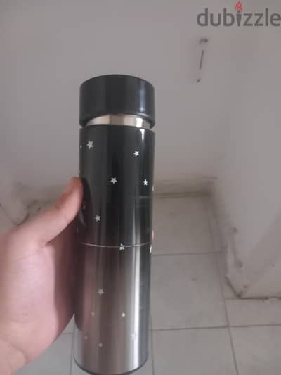 مج حرارى وحزام جلد للشنطة