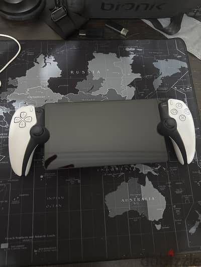 PS PORTAL WITH A SCREEN COVER AND THUMBSTICK GRIP