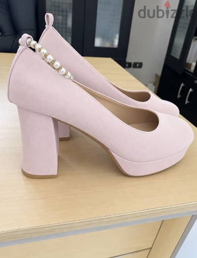 Pink heels, bought from one month