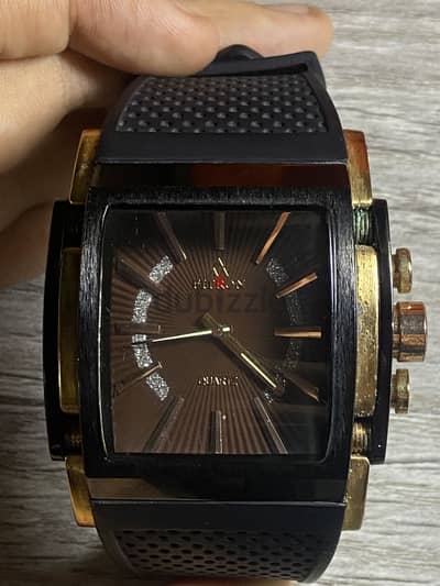 ساعة Fitron Quartz وارد دبي - بحالة ممتازة جداً