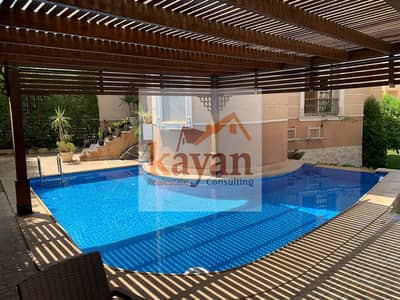 Own a distinctive villa in Rehana Compound, located opposite Waterway.