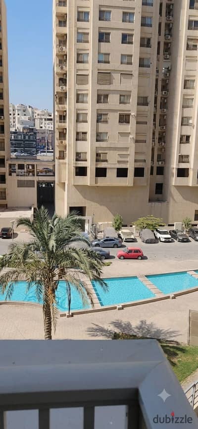Apartment for rent in Zahraa El Maadi, Tabarak View Compound, open to the lakes, fully loaded, 145 m², old loading, consisting of 3 rooms - reception - 3 bathrooms including a master - kitchen