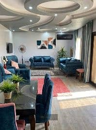 Special apartment for rent with an area of 165 m in Al-Khamail Compound - Sheikh Zayed City - fully furnished with a distinctive view