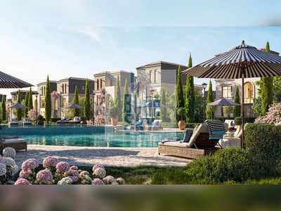 Ground-floor apartment with a garden for sale, featuring high-end ("super-lux") finishing and a 9-year installment plan; located in New Cairo, just mi