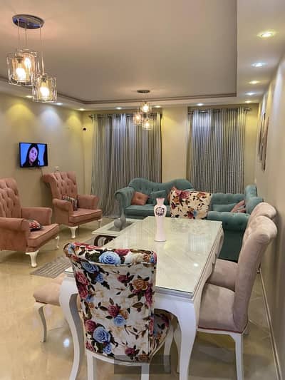 Apartment for sale in Dar Misr Compound 12 - Sheikh Zayed with an area of 130 meters on the fifth floor, fully furnished, super lux, close to all services, hubs, and main roads in front of the Gate Mall
