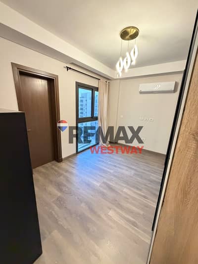 شقه للايجار نص مفروش بالتكيفيات والمطبخ كمبوند ابراج زد ويست الشيخ زايد