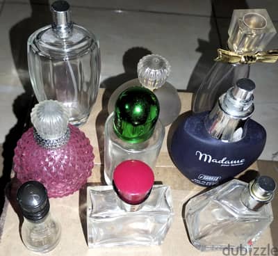 زجاج عطور فارغه لاعاده الملىء