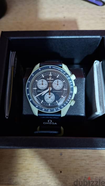omega swatch جديده