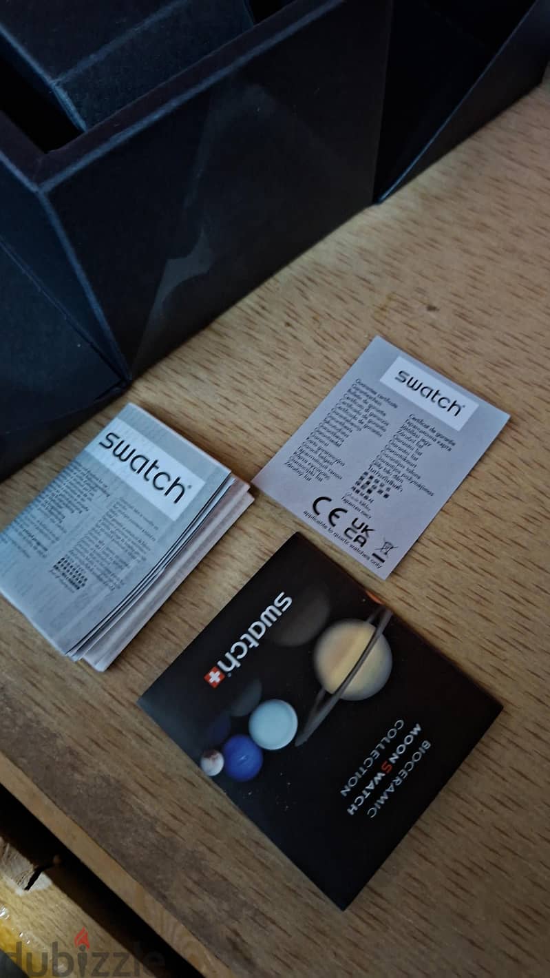omega swatch جديده 5