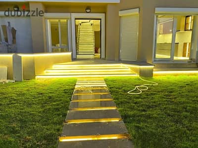 A stunning villa with a garden and private rooftop, offering natural views and privacy, from Madinat Misr Company.