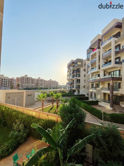 Apartment for rent in Kalma Compound, October Gardens, near Sun Capital and Al-Fayoum Road, 3 rooms, first occupancy, open landscape view, 180m