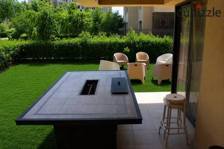 Ground floor for sale fully finished in O West Compound 6 October 195 m2 with garden 105 m2