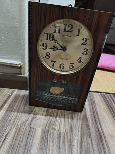 RHYTHM clock