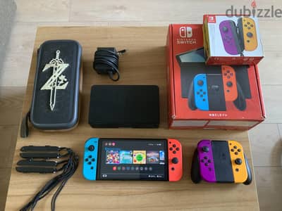 Nintendo switch oledمعدل + extra joycons + Zelda Case