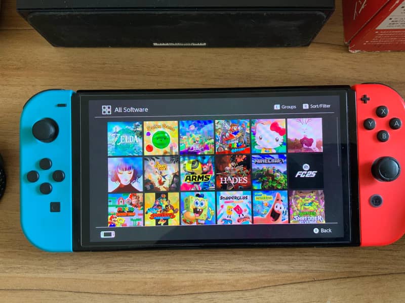 Nintendo switch oledمعدل + extra joycons + Zelda Case 1