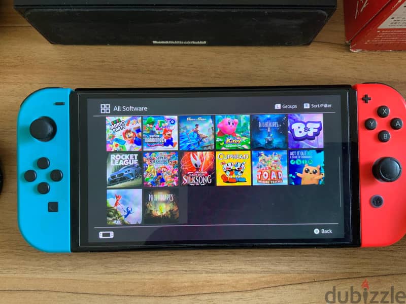 Nintendo switch oledمعدل + extra joycons + Zelda Case 2