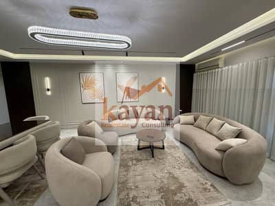 Furnished 3-bedroom apartment for rent in Mohandessin, near the intersection of Shehab Street.