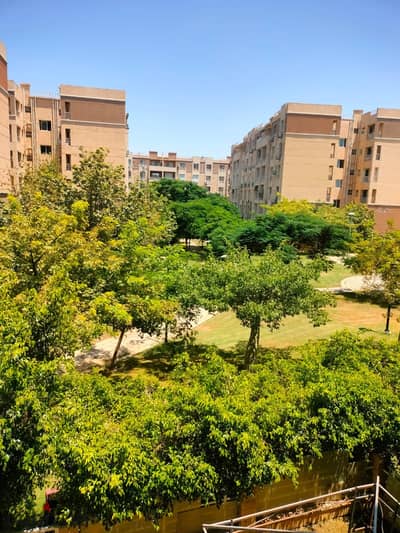 Quick sale: 96 sqm unit in Madinaty (B7), first floor, north-facing, with custom finishing and a prime garden view.