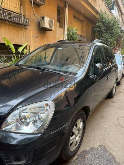 Kia Carens 2010 كيا كارينز 2010 مالك اول فابريكا بالكامل