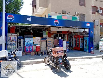 For sale in Al Shabab Al Janoubi, a shop of 42.5m² + an outdoor area of ​​45m², L-shaped, on Ahmed Shawky Axis