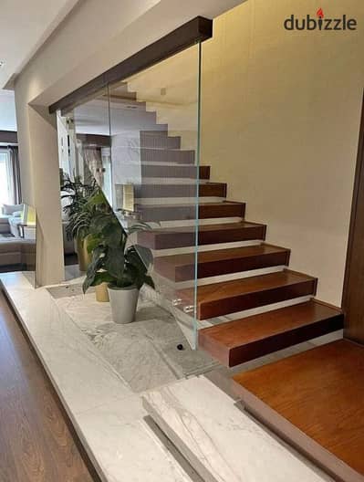 Corner townhouse with a prime layout for sale fully finished with installments over 15 years located on the Suez Road near Al Shorouk Patio Prime and