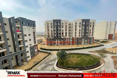 Open view of the street and landscape apartment with a private garden in Alex West