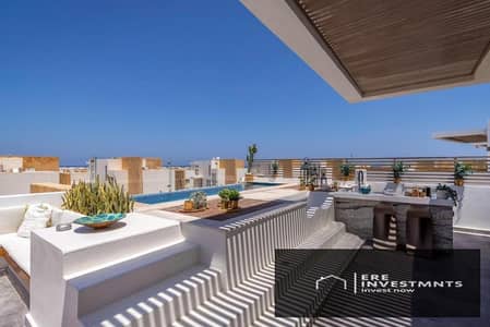 Sky loft for sale in Sea Shell North Coast - furnished with air conditioning and kitchen, full sea view, at the lowest price in the market