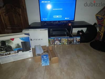 ps4 pro +  2 controllers  original +  5 gimes  السعر نهائي