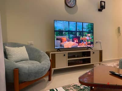 Ground apartment with private garden for rent at The Address Compound. 2BR+1Bath, 70m² + 150m² garden. Modernly furnished. 4,000 EGP/day - 50k/mo.