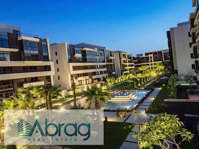 Apartment for sale in a compound in Sheikh Zayed Waterway West, finished, with installment plans over 9 years