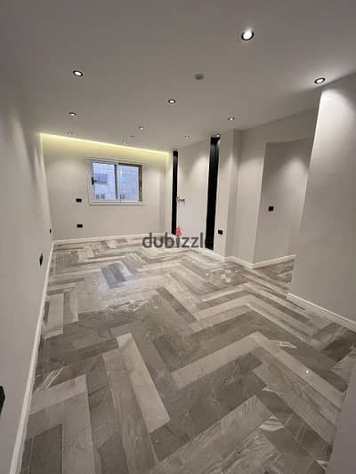 For sale apartment 110 meters side rear at a price lower than the market on unspoiled vacant land in the Gardens of the Pyramids