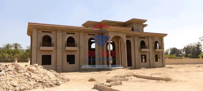Villa for Sale | Ofok Compound – Cairo Alexandria Desert Road  Land Area: 5,200 sqm BUA: 1,200 sqm Two Floors Unfinished