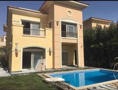 Standalone villa with a private pool view for sale in the Telal East compound, Fifth Settlement—minutes away from Cairo Airport and the American Unive