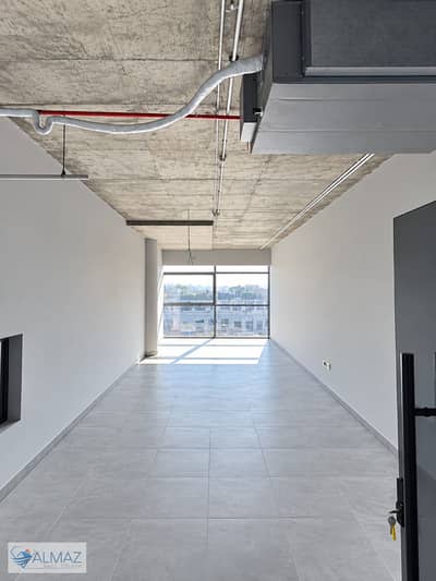 Unfurnished office (70 sqm) for rent, including A/C units, located directly on South Teseen Street in the Fifth Settlement.