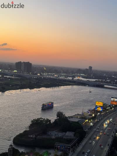 Luxury 3-bedroom apartment with Nile view in a prime location on Maadi Corniche, directly on the 26th floor - for sale with furnishings, appliances. .