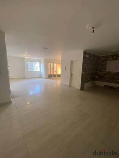 Ground-floor apartment with a garden for sale in Al Rehab; prime location near Services.
