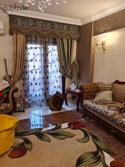 Apartment for sale in Al-Fursan Compound next to Al-Said Club on Al-Qatameya Ring Road with an open view including kitchen units area of 200m consisting of 4 rooms - reception - kitchen