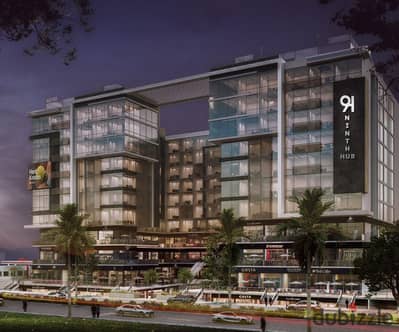 32 sqm ground-floor shop for sale in Ninth Hub Mall, Central Axis, 6 October. Prime investment with 10% down payment and installments up to 10 years.