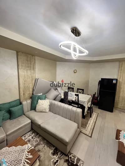 Studio for Sale in Al Rehab 5th Phase  60 sqm studio 45 sqm private garden Ultra Super Lux finishing Includes the kitchen and living room furniture