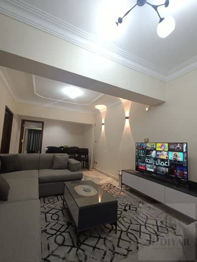 Furnished apartment for rent on Ahmed Orabi Street in Mohandessin                                                                                    ,