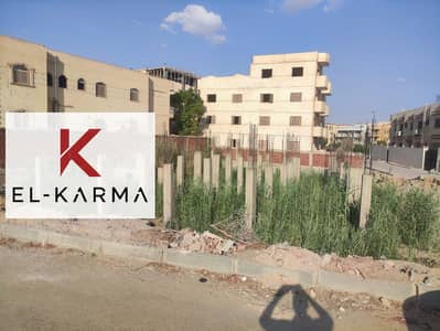A piece of land for sale in the fourth neighborhood, on the corner of the walkway, City of Obour