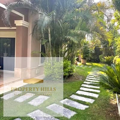 A distinguished villa for sale in a prime location next to The Estates compound.