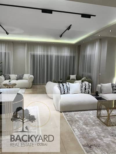 VIP Apartment for sale under market price next to mivida and auc with D. P 5% only , installment over 10 years