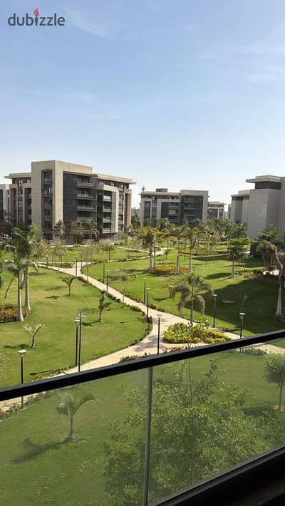 Front-facing apartment with a direct sea view overlooking golf courses for sale at a great discount Strategic location minutesfrom Taj City Nasr city
